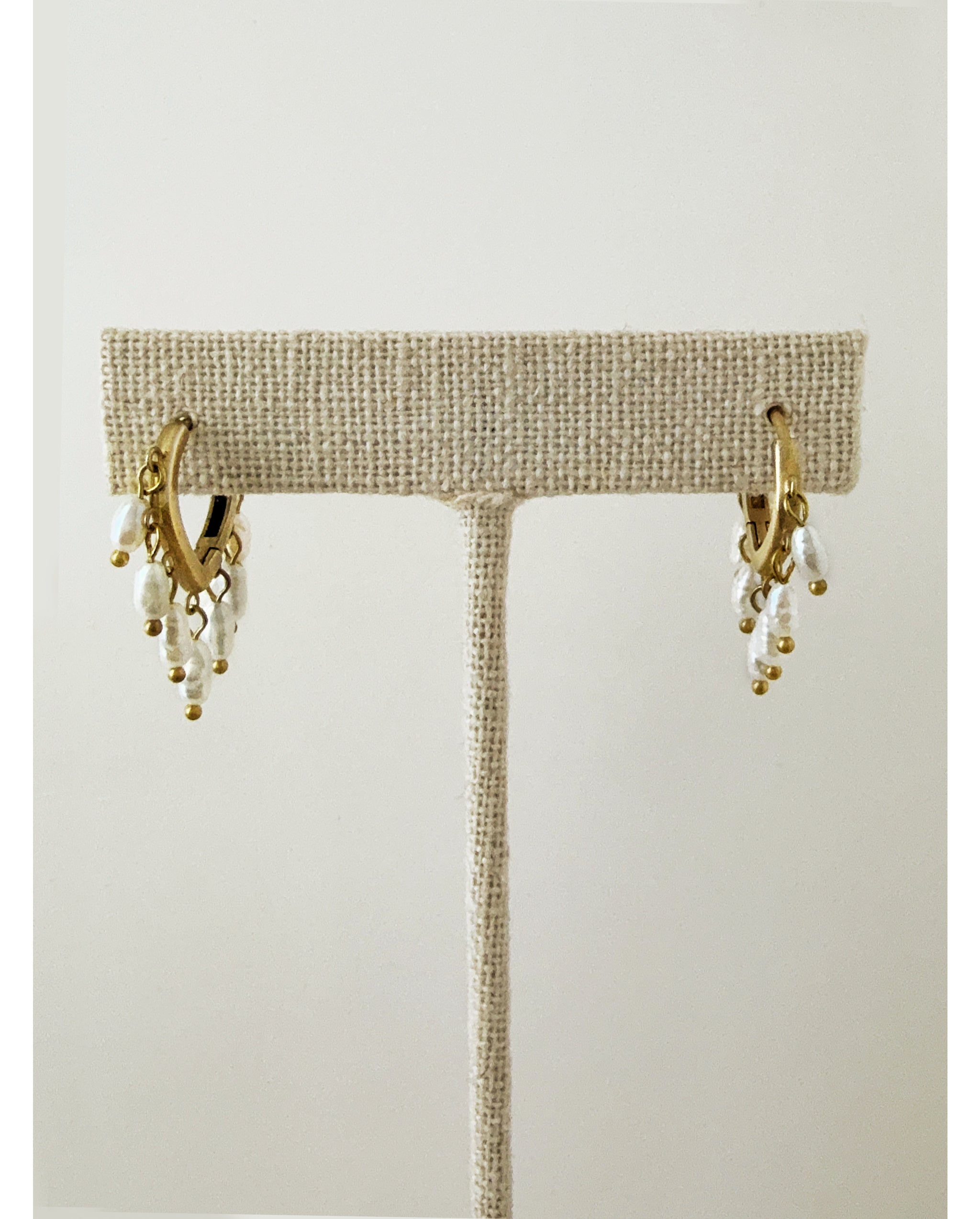 Calitha Huggie Earring – White Pearl – A handcrafted earrings by Alysian.
