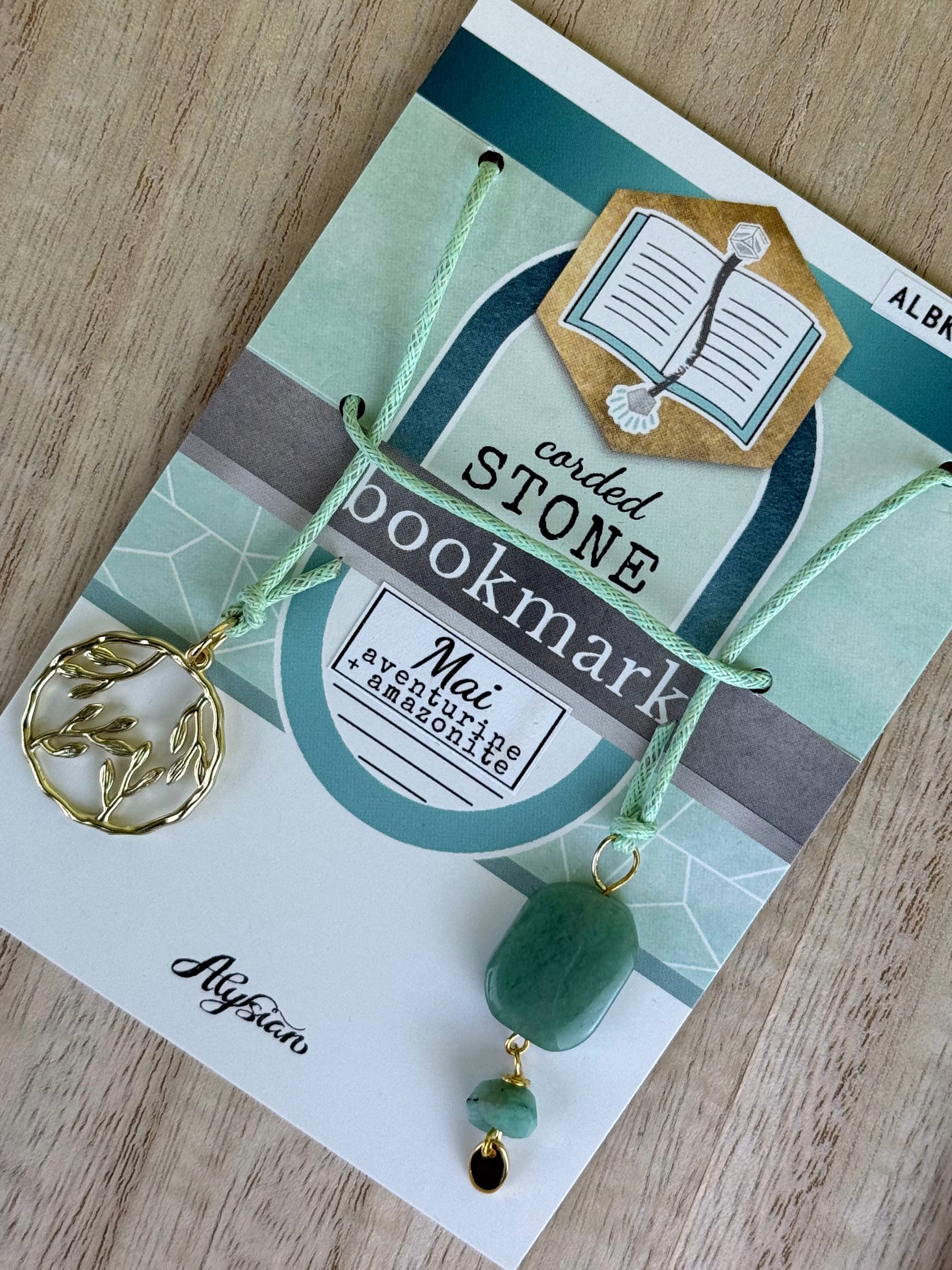 Mai Aventurine + Amazonite gemstone bookmark is pictured on a branded card.