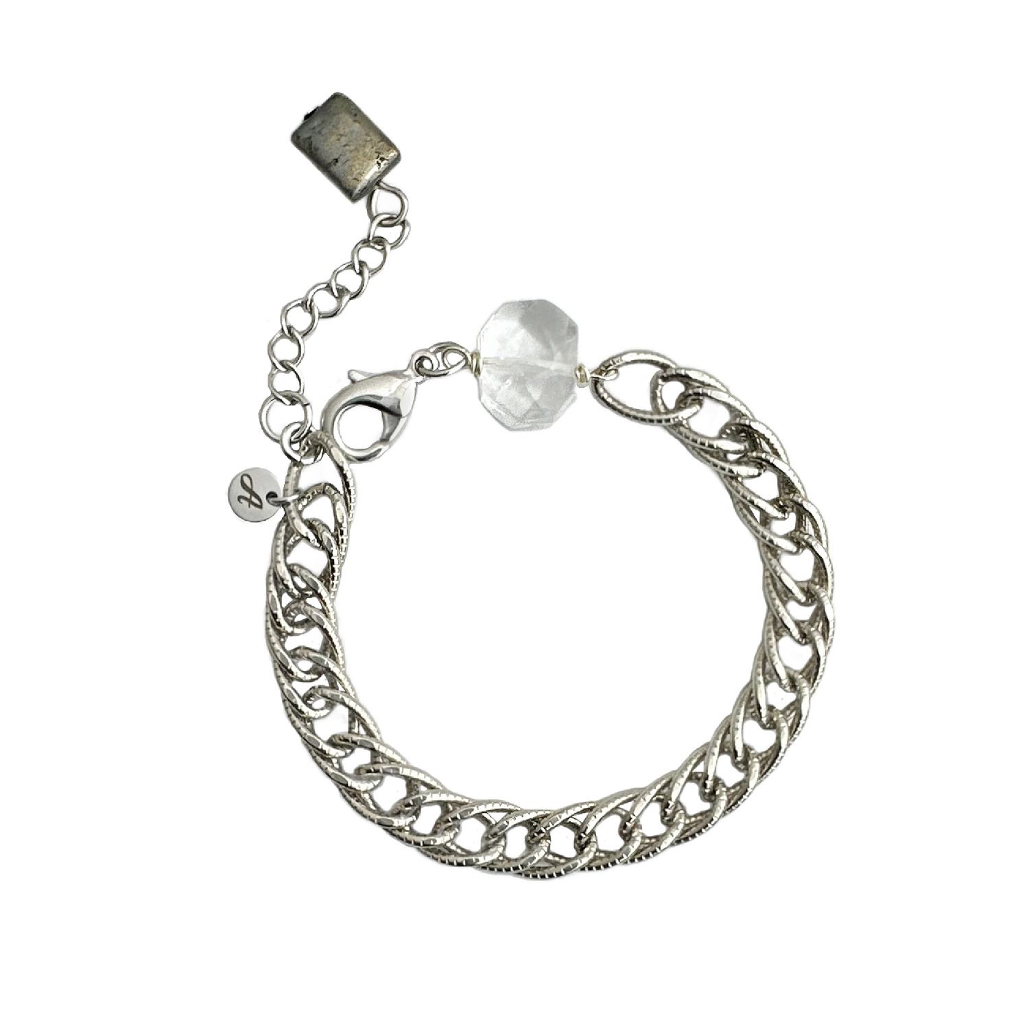 A bracelet of vintage silver-plated brass textured chain, with modern clear quartz crystal and pyrite stones. Handcrafted by Alysian. 