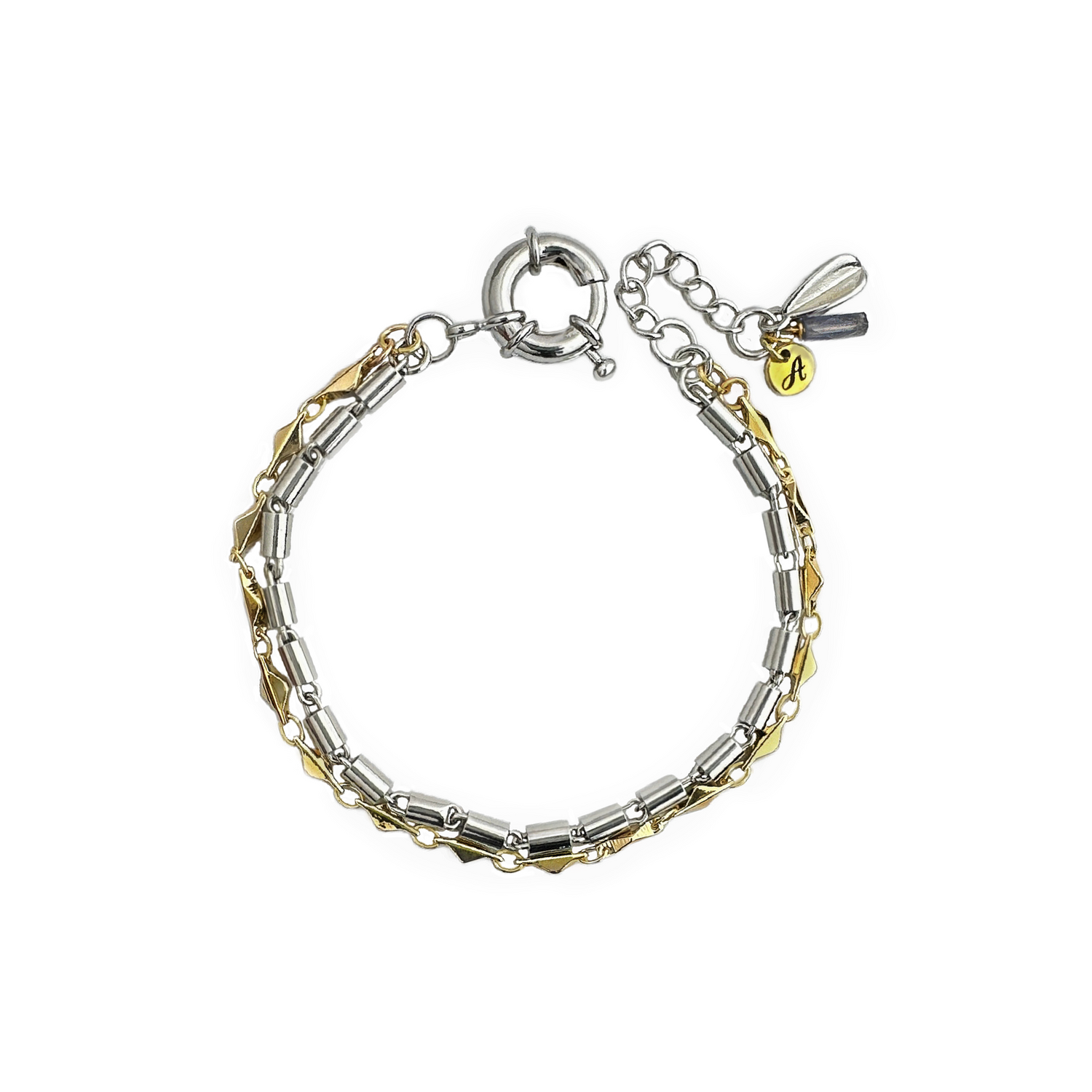 A refined two-tone bracelet with vintage and new unique-link chains, one silver-plated and one gold-plated chain, with an iolite stone drop with a silver-plated metal charm and clasp. 
