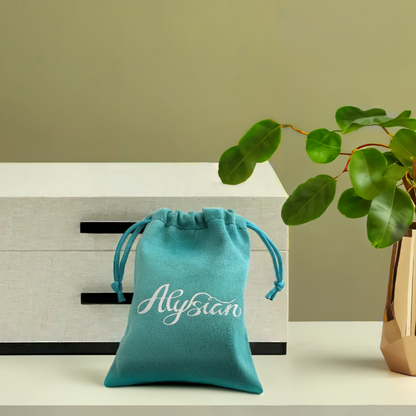 small velvet Alysian branded jewelry pouch