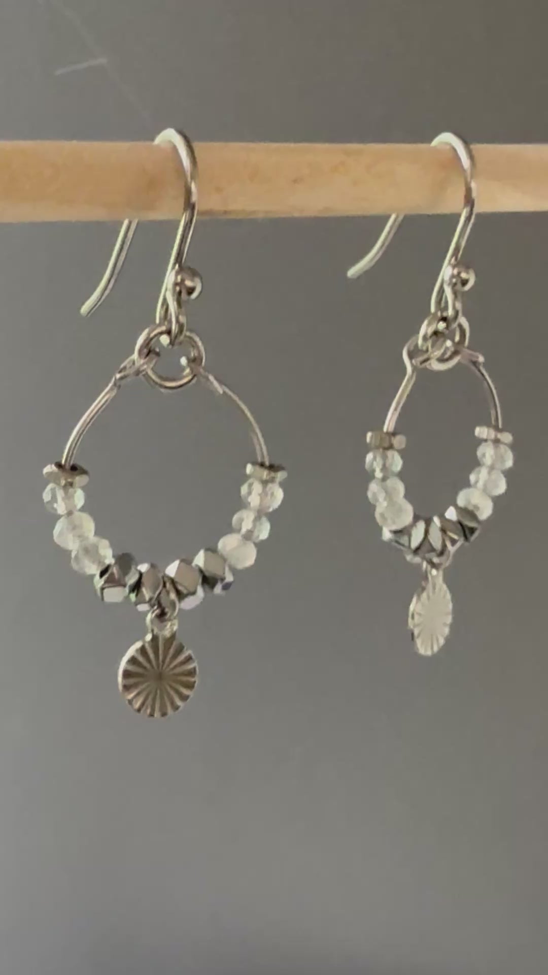 A video of the Nara labradorite gemstone beaded stainless steel hoop earrings up close.