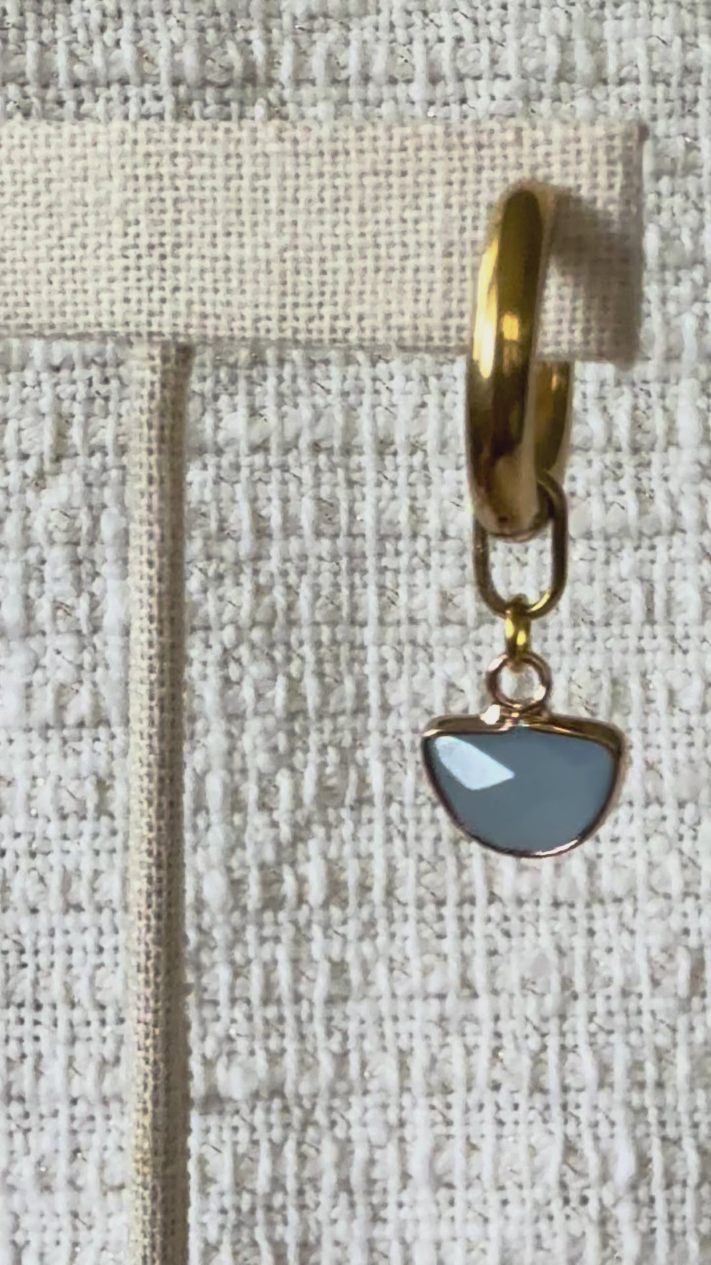 Video of the Charvi Chalcedony Hoop, showing the front and side view  - gold with blue chalcedony semicircle bezel-set stone drops. Handcrafted by Alysian.