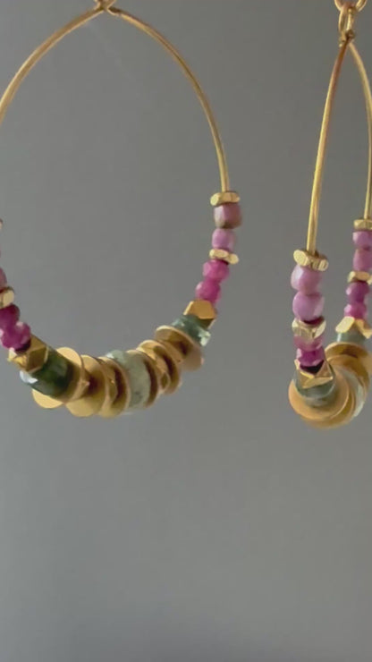 A video of Alysian Mirelle Multistone Hoop Earrings close up with gemstones and brass accents shimmering.